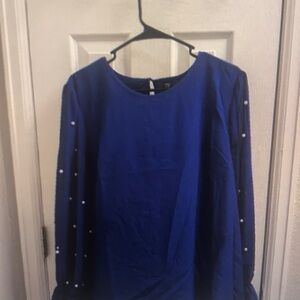 Many Shein blouses with pearls